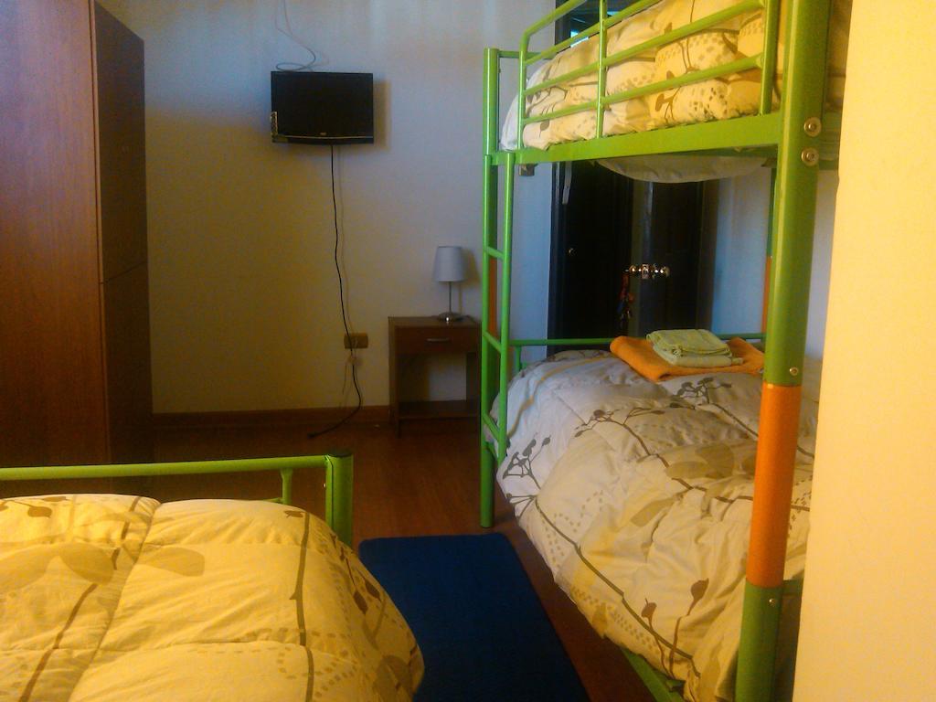 Hostal Barrio Italia Сантьяго Номер фото